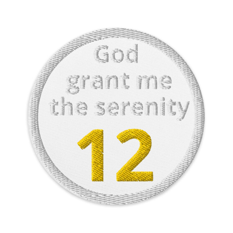 3 inch circle patch with a white outline that kind of blends in with the white background. With the words "God grant me the serenity" written in white centered above the number "12" in gold. denimandpatches