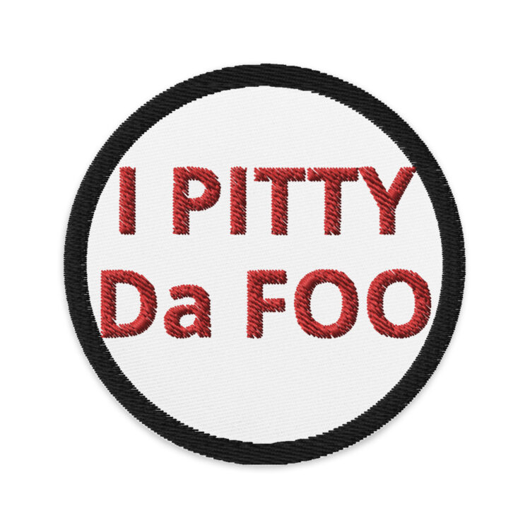 3 inch circle patch with a black line for an outline around a white background. With the words "I PITTY Da FOO" written in red centered in the middle of the circle. denimandpatches