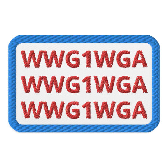 3 inch rectangle shaped patch with a light blue outline around a white background. With the letters "WWG1WGA" repeated 3 times on top of each other in the rectangle in red. denim and patches